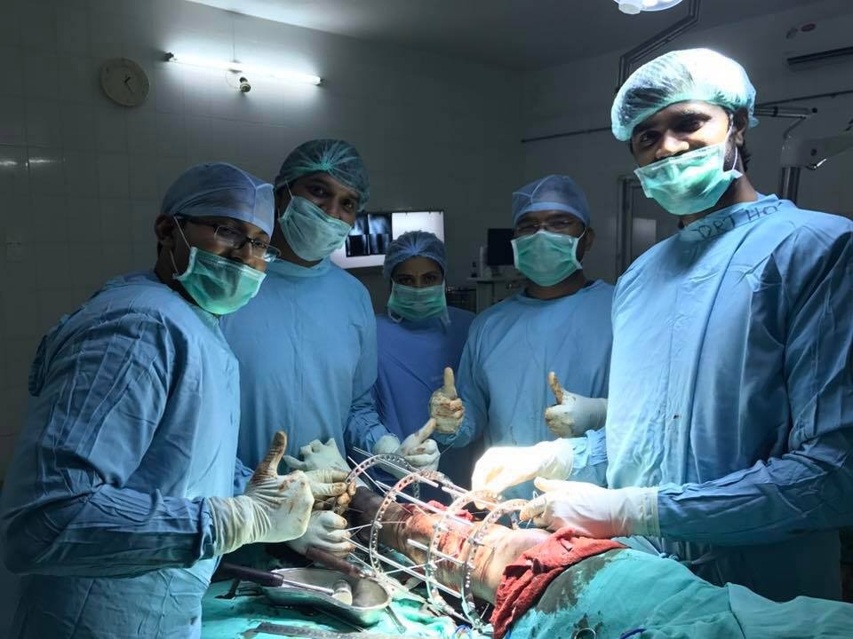 Dr. K. Prashanth Kumar and surgical theater team following successful complex limb stabilization with Ilizarov external ring fixator