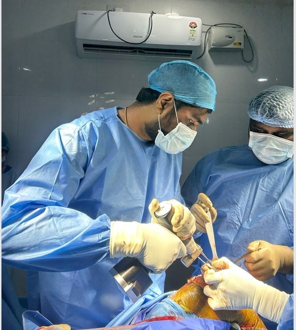Dr. K. Prashanth Kumar performing precision Total Knee Arthroplasty in sterile surgical theater